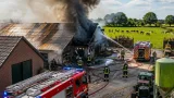 Grote loodsbrand in Maasmechelen: zwarte rookpluim boven Zuid-Limburg, niemand gewond